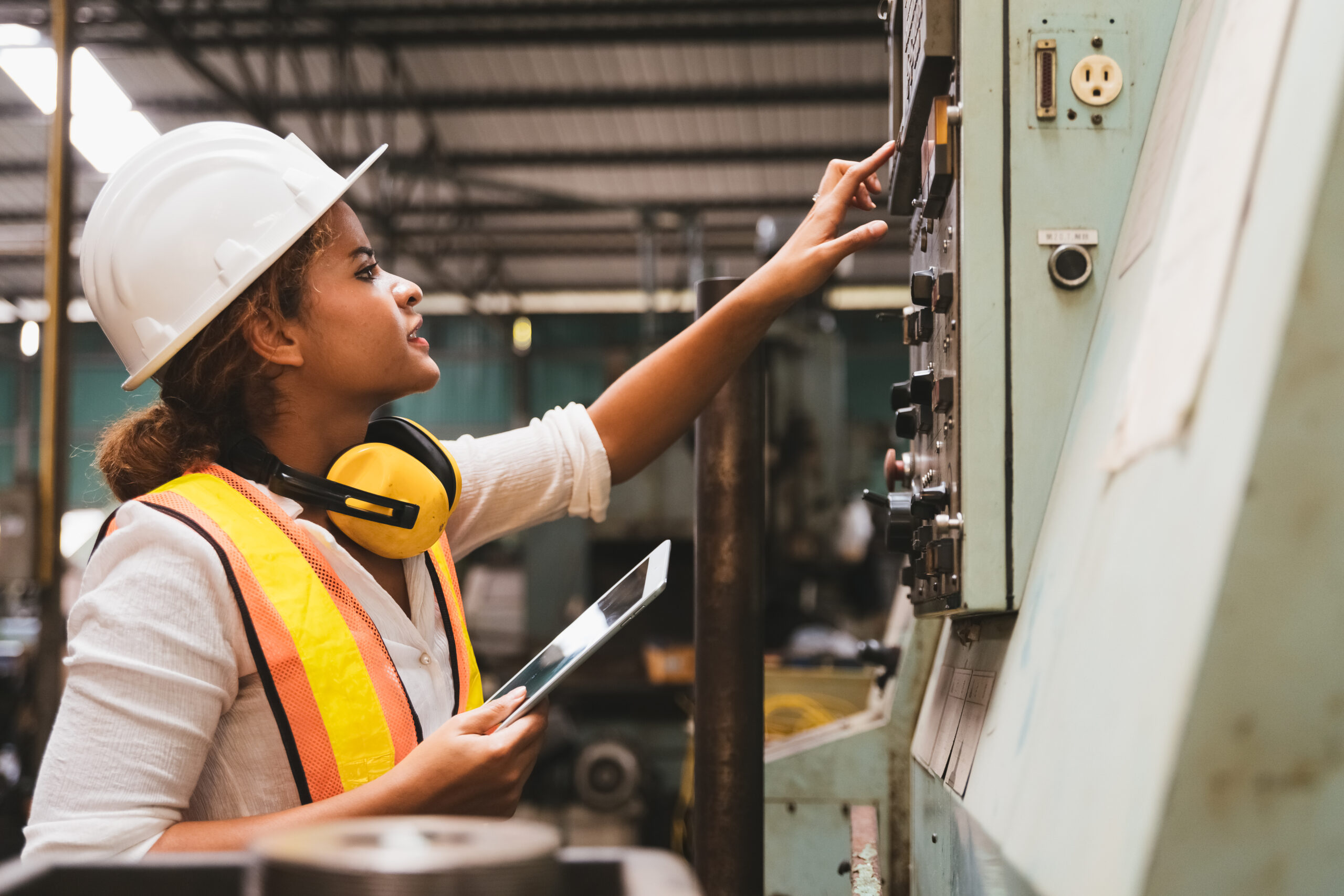 Industrial factory maintenance engineers woman inspect relay pro