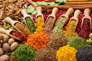 Image of different types of food and wooden scoops