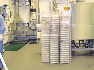 Stacks of animal cages at a Vivarium facility | Hapman.com